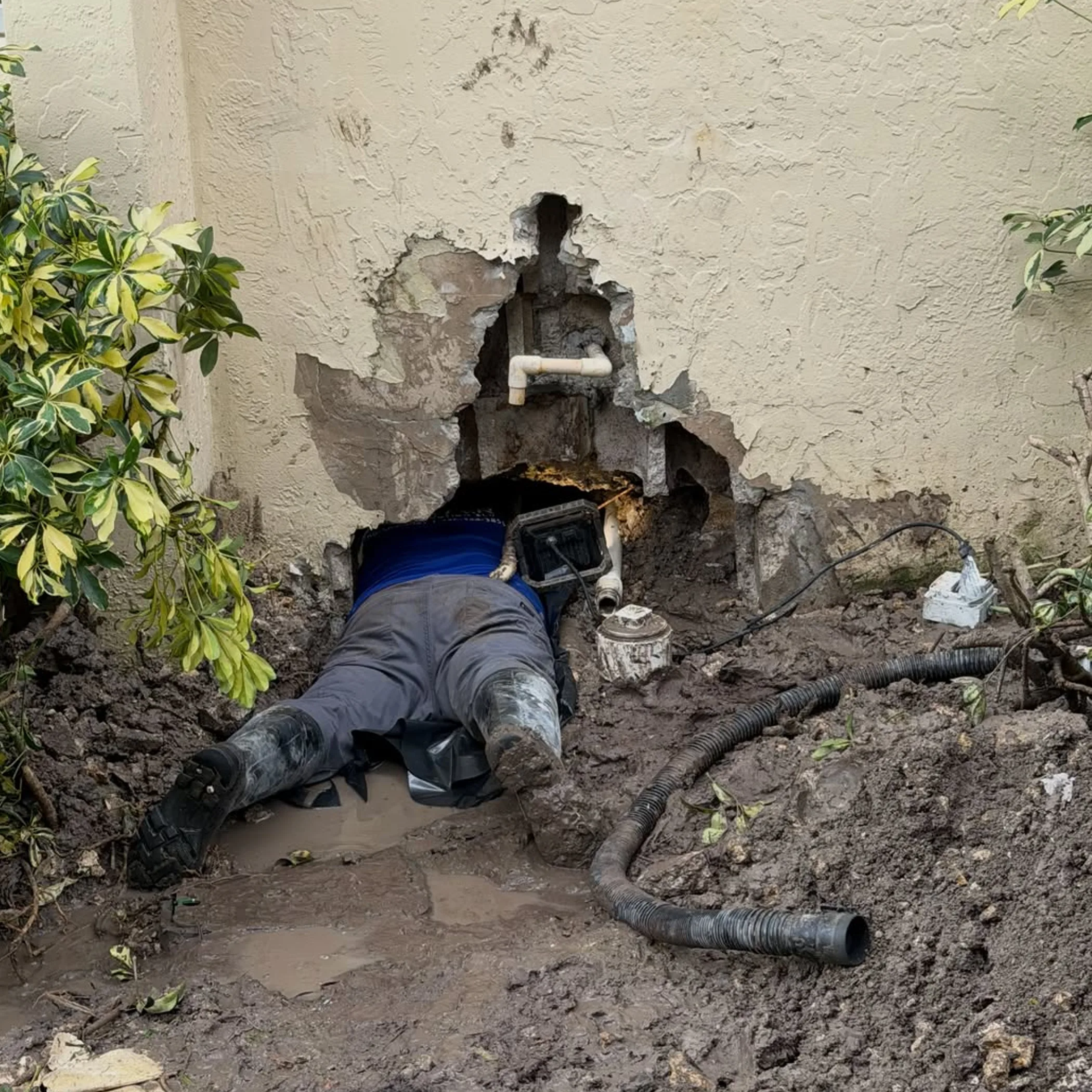 exterior plumbing problem under repair